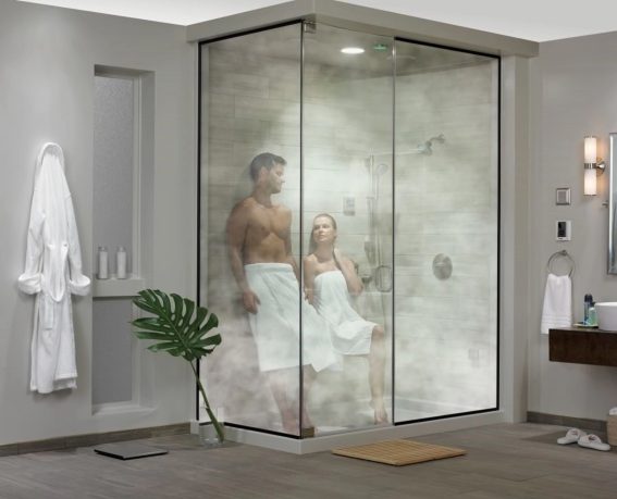 A couple is enjoying steam baths in a modern steam room.